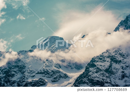 Mountain peaks near Morskie Oko Lake in Poland at Winter. Tatras range 127708689