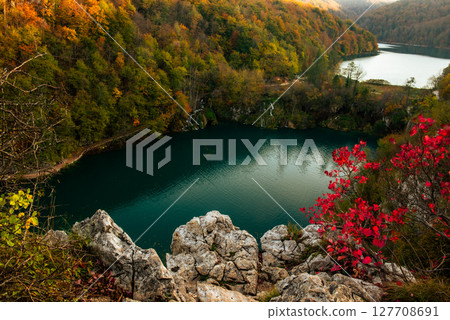 Autumn colors and lake of Plitvice National Park in Croatia, seasonal colorful background Autumn colors and lake of Plitvice National Park in Croatia, seasonal colorful background 127708691