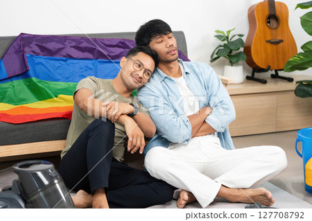 LGBTQIA Couple Enjoying Cozy Moment at Home 127708792