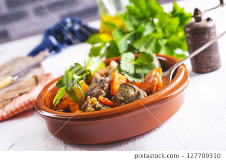 Fried chicken liver with onions and carrots Fried chicken liver with onions and carrots 127709310