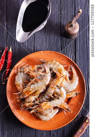 shrimps raw gambas seafood prawn healthy meal food snack on the table copy space food background rustic top view 127709388