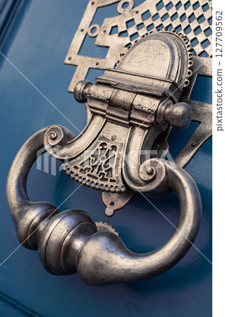 Detail of a French mansion door Detail of a French mansion door 127709562