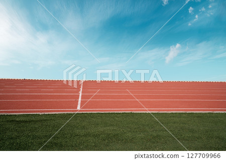Empty athlete track or running track with blue sky. 127709966