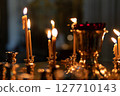 Candles burning in an Orthodox church. 127710143