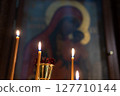 Candles burning in an Orthodox church. 127710144