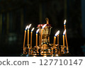 Candles burning in an Orthodox church. 127710147