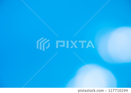 Blue sparkly background material (photo material) 127710294