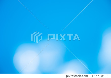 Blue sparkly background material (photo material) 127710302