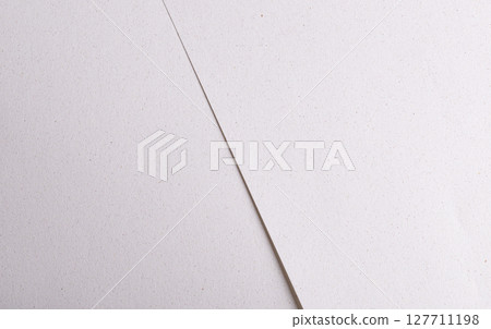 Premium minimalistic pastel paper with a smooth matte surface, offering an elegant monochrome Premium minimalistic pastel paper with a smooth matte surface, offering an elegant monochrome 127711198
