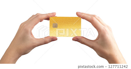 Bank card held in two hands, showcasing debit or credit card with chip for secure payment. Bank card held in two hands, showcasing debit or credit card with chip for secure payment. 127711242