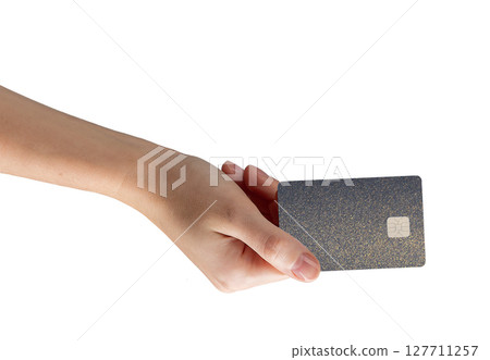 Bank card in hand, showcasing debit or credit card for secure payment. Representing modern finance, 127711257