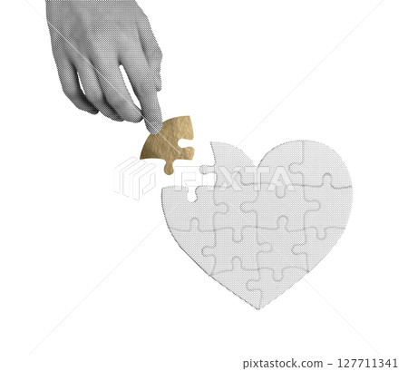 Golden puzzle piece fitting perfectly into a heart, symbolizing love, connection, and healing. 127711341