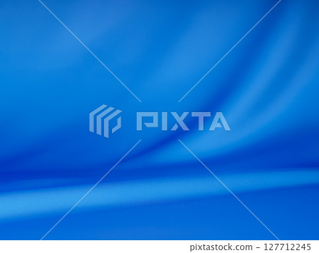 The gentle draping of blue fabric creates an intellectual atmosphere. 127712245