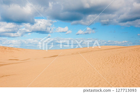 A simple landscape of blue sky, clouds and Tottori sand dunes A simple landscape of blue sky, clouds and Tottori sand dunes 127713093