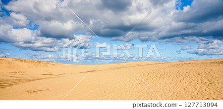 A simple landscape of blue sky, clouds and Tottori sand dunes A simple landscape of blue sky, clouds and Tottori sand dunes 127713094