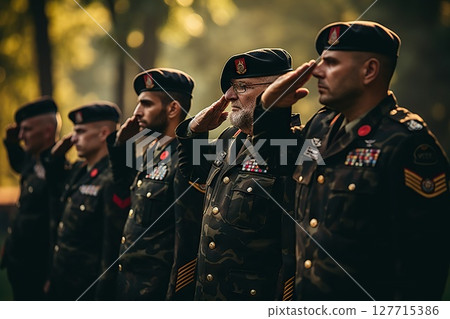 Honoring Sacrifice Veterans Salute as Soldiers Pay Tribute to Fallen Comrades, A Heartfelt Moment of Remembrance and Gratitude. 127715386