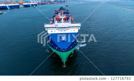 Aerial view from drone, Container ship or cargo shipping business logistic import and export freight transportation by container ship in open sea, Container loading cargo freight ship boat. 127716783