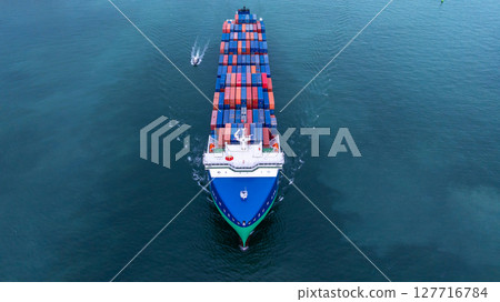 Aerial view from drone, Container ship or cargo shipping business logistic import and export freight transportation by container ship in open sea, Container loading cargo freight ship boat. 127716784