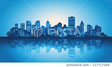 Urban skyline reflecting on calm water during twilight with blue hues illuminating the cityscape 127717269