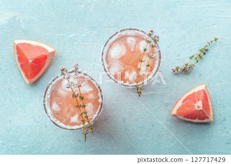 Salty Dog cocktail with fresh grapefruit juice, lime juice, and thyme 127717429