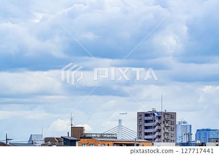 Cloudy sky, Harp Bridge and airplane Cloudy sky, Harp Bridge and airplane 127717441