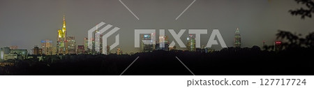 Frankfurt skyline at night with illuminated skyscrapers 127717724