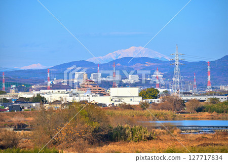 [Aichi Prefecture] Shonai River and snow-capped Mt. Ontake and Mt. Norikura from Shonaigawa Ohashi Bridge in Kasugai City 127717834