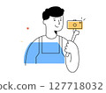 A happy male vlogger holds camera on selfie stick recording video content, representing modern social media content creation and digital technology engagement 127718032