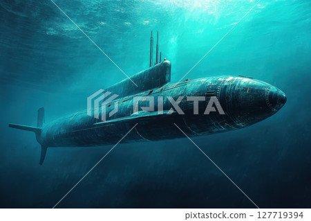 Submarine gliding through dark ocean waters showcasing the beauty and mystery of underwater exploration during the early morning light 127719394