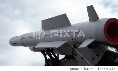 Military equipment with advanced missile technology is positioned in a war zone, ready for use in escalating conflicts. 127720512