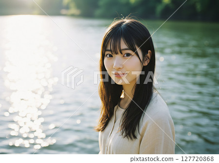 大自然中一位容光煥發的年輕女子的畫像 大自然中一位容光煥發的年輕女子的畫像 127720868