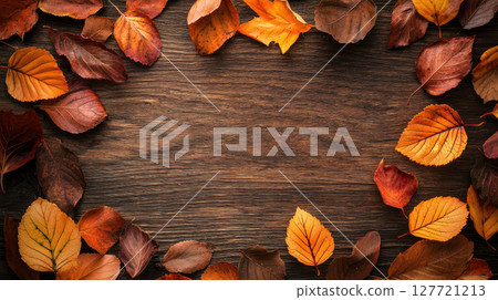 cozy backdrop featuring warm orange and brown tones with scattered leaves creates serene atmosphere 127721213
