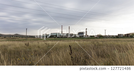 old USSR factory exterior, industry building is in a state of disrepair 127721486