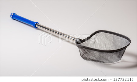 A blue-handled butterfly net rests on a white background 127722115