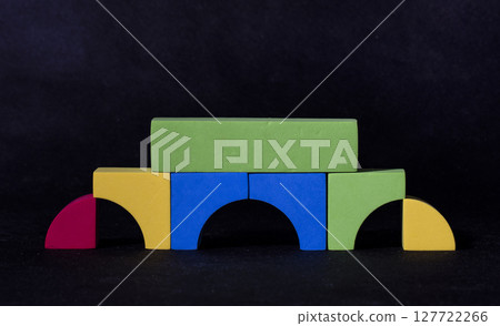 structure is built from children's blocks, toy, children's game structure is built from children's blocks, toy, children's game 127722266