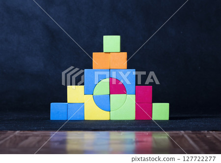 structure is built from children's blocks, toy, children's game structure is built from children's blocks, toy, children's game 127722277