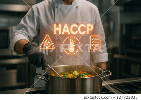 Chef in industrial kitchen cooking vegetables in boiling water while applying HACCP standards for thermal processing and food safety compliance control 127722835