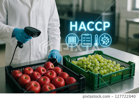 Food safety inspector scanning crates of apples and grapes in laboratory setting with HACCP hologram and icons for control, temperature, and contamination 127722840