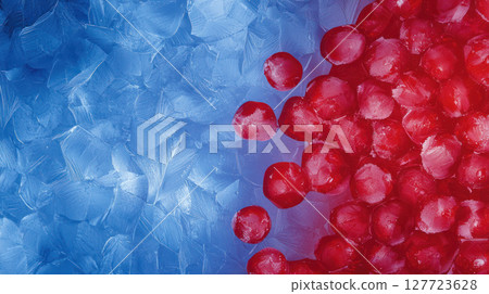 Frosty textures with red and blue ice spheres create vibrant contrast 127723628