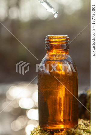 Glass dropper with amber medicine bottle Glass dropper with amber medicine bottle 127723801