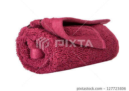 Rolled maroon bath towel isolated 127723806