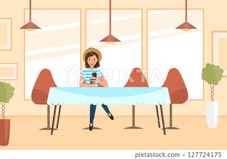 A girl is waiting for young people. Sitting in cafe, chatting and watching the smartphones. A girl is waiting for young people. Sitting in cafe, chatting and watching the smartphones. 127724175