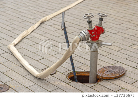 Water Hydrant From Manhole 127726675