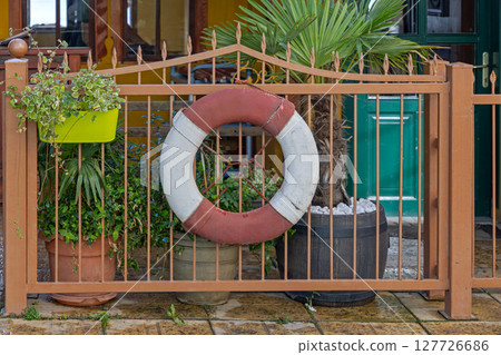 Life Ring at Fence 127726686
