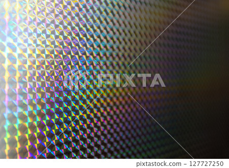 Holographic surface reflecting rainbow colors creating stunning visual effect Holographic surface reflecting rainbow colors creating stunning visual effect 127727250