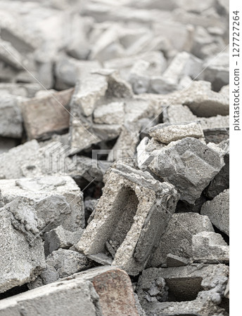 Pile of gray concrete and brick rubble debris from demolished building Pile of gray concrete and brick rubble debris from demolished building 127727264