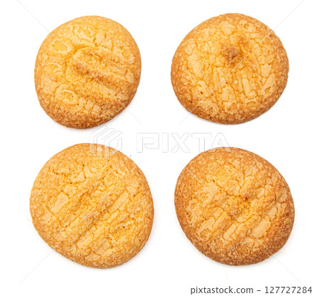 Four corn cookies arranged on white background representing snack and indulgence 127727284
