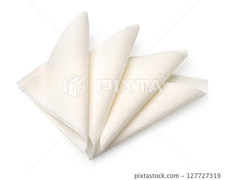 Four folded white paper napkins isolated on white background Four folded white paper napkins isolated on white background 127727319