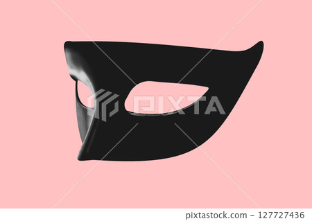 Black carnival mask on pink background Black carnival mask on pink background 127727436
