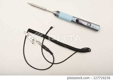 New electronic soldering irons with stingers. Soldering iron with a grounding wire. 127728236